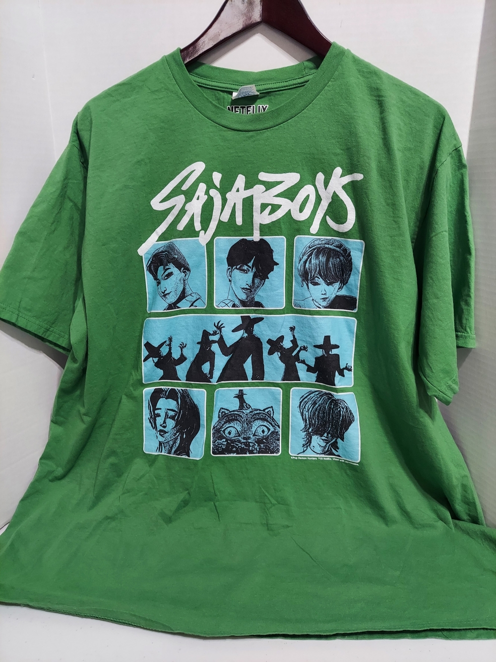 Netflix KPop Demon Hunters Saja Boys graphic t-shirt featuring a multi-paneled.